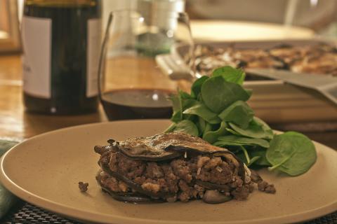 Moussaka eggplant meat tomato sauce olives greek dish 